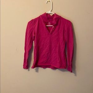 this is a pink collard shirt with long sleeves